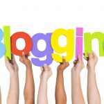 Multi Ethnic People Holding The Word Blogging